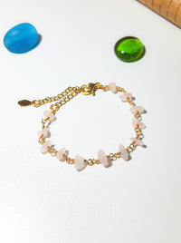 Petal of Love Rose Quartz Bracelet on white background showcasing gold wire wrapped rose quartz crystals for love and healing, handmade in Sri Lanka