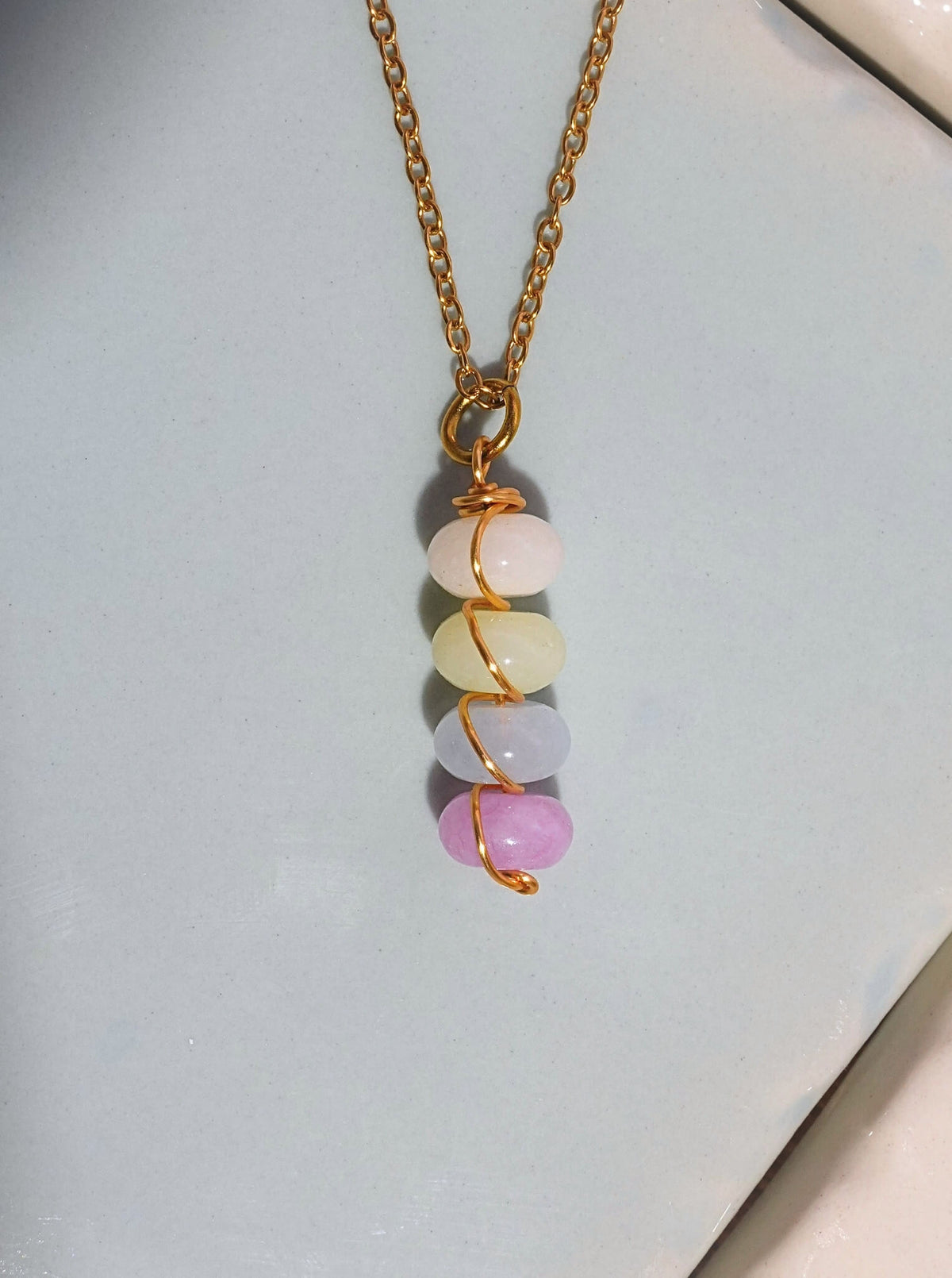 Lady of the Lake Mist Candy Jade wire wrapped necklace worn on model blue lavender aqua stacked stone pendant gold chain Laganna