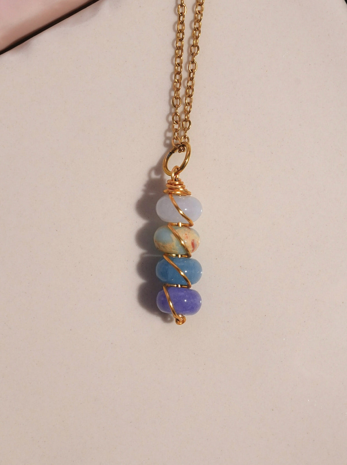 Lady of the Lake Dawn Candy Jade necklace blush pink cream lavender stacked bead pendant gold chain flat lay handcrafted Laganna