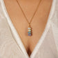 Lady of the Lake Dawn Candy Jade wire wrapped necklace worn on model blush pink lavender cream stacked stone pendant gold chain Laganna