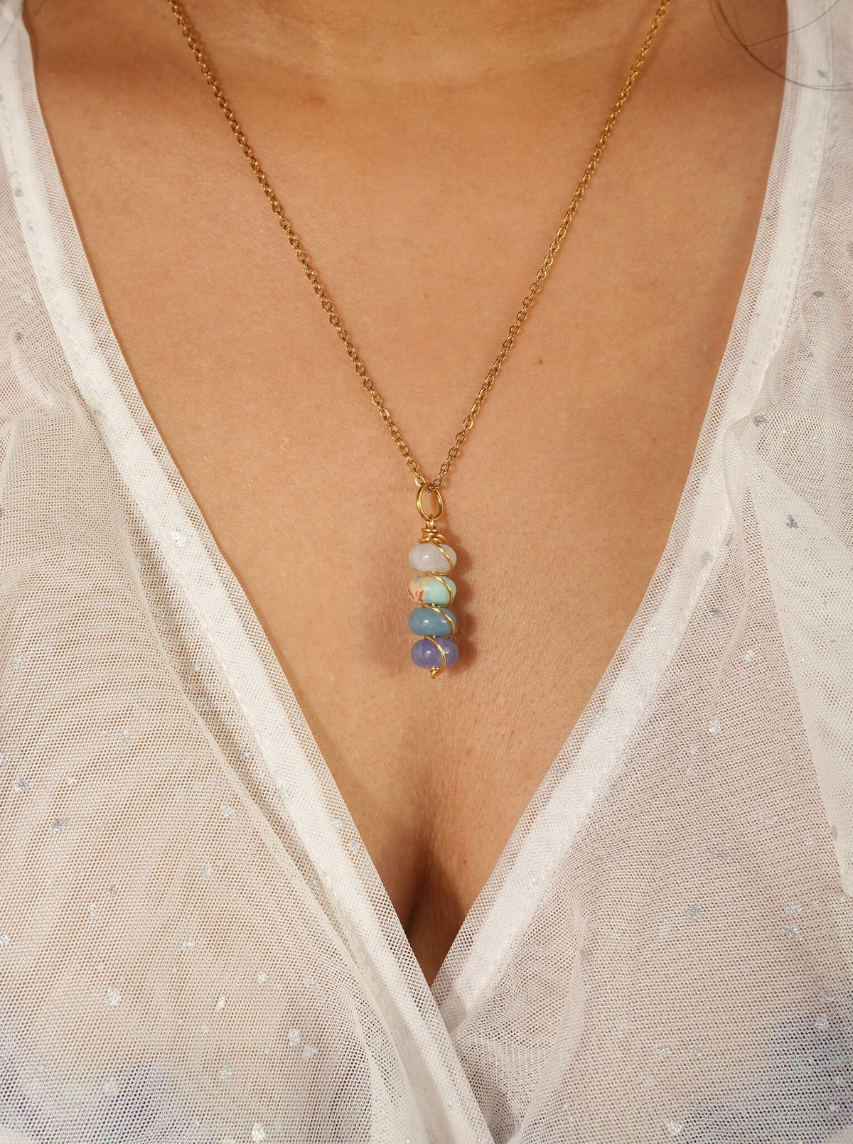 Lady of the Lake Dawn Candy Jade wire wrapped necklace worn on model blush pink lavender cream stacked stone pendant gold chain Laganna