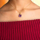 Detailed closeup of amethyst clover pendant necklace worn styling, highlighting the exquisite purple gemstone clover shape and gold wire wrapping craftsmanship - handmade healing crystal jewelry from Sri Lanka for calming energy and spiritual wellness