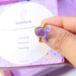 Amethyst irregular stone ring jewelry box held in hand showing handmade gold wire wrapped healing crystal gift set, Sri Lankan artisan spiritual ring featuring natural purple gemstone perfect as third eye chakra jewelry gift for stress relief and meditation practice