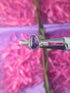  Handmade amethyst irregular stone ring in silver wire wrapped design featuring natural healing crystal jewelry crafted by Sri Lankan artisans as spiritual protection ring and third eye chakra balancing amulet for women seeking stress relief and better sleep with raw purple gemstone energy