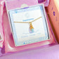 Aquamarine irregular stone necklace in gold wire wrap with jewelry box packaging, handmade Sri Lankan healing crystal pendant for throat chakra and communication