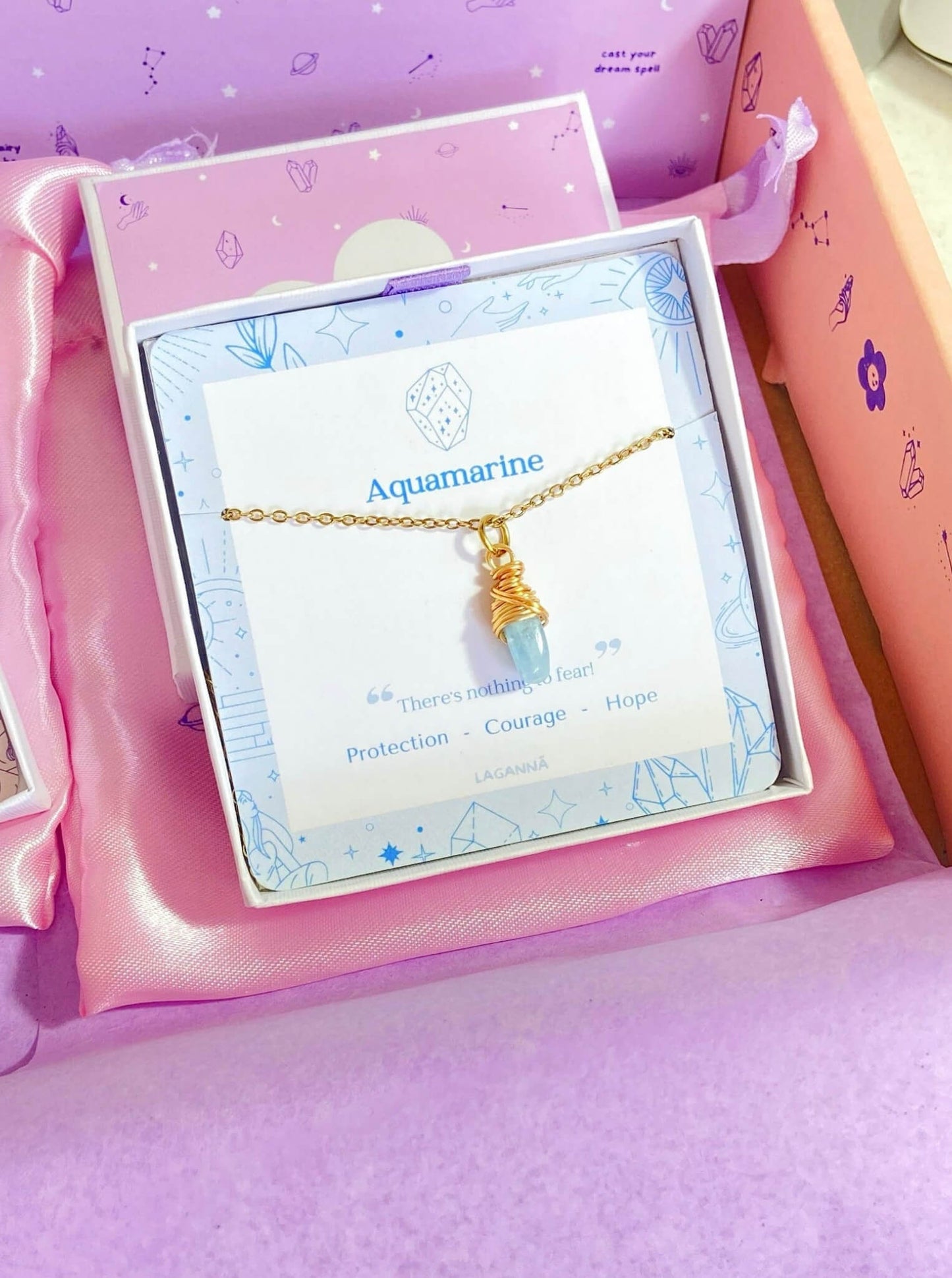 Aquamarine irregular stone necklace in gold wire wrap with jewelry box packaging, handmade Sri Lankan healing crystal pendant for throat chakra and communication