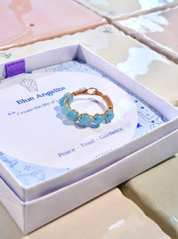 Blue Angelite Braided Ring gold wire wrapped blue stone beads in Laganna gift box blue card Peace Trust Guidance, handmade healing crystal ring Sri Lanka Laganna
