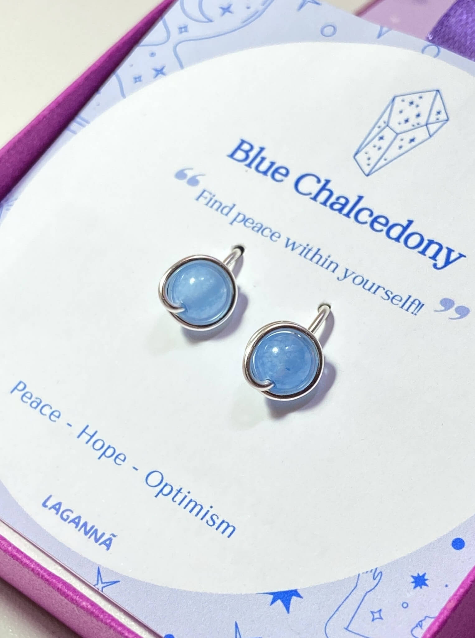 Blue Chalcedony Petite Round Stud Earrings in purple Laganna gift box with branded packaging close up - handcrafted healing crystal jewelry from Sri Lanka featuring natural blue chalcedony for calm