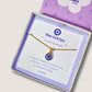 Blue evil eye necklace in elegant Laganna jewelry box showing handmade gold protection pendant packaging, Sri Lankan artisan spiritual jewelry gift set featuring wire wrapped healing crystal necklace as evil eye talisman with premium branded presentation