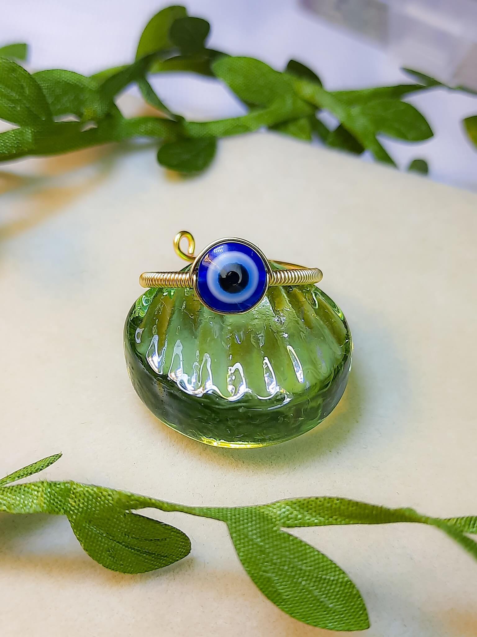 Gold blue evil eye protection ring featuring handmade Sri Lankan spiritual jewelry design, adjustable wire wrapped healing crystal ring perfect as boho evil eye talisman and protective amulet for anxiety relief and chakra balancing meditation