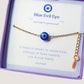 Blue evil eye bracelet in elegant Laganna jewelry box showing handmade gold protection bracelet packaging, Sri Lankan artisan spiritual jewelry gift set featuring wire wrapped healing crystal bracelet as evil eye talisman with premium presentation