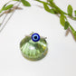 Handmade blue evil eye protection ring in adjustable silver wire wrapped design, featuring spiritual healing crystal jewelry crafted by Sri Lankan artisans as a protective talisman and boho chic amulet for women seeking anxiety relief and chakra balancing