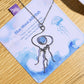 Blue Moon Jellyfish Necklace with Blue Chalcedony displayed on Laganna gift box with crystals and greenery lifestyle styling handmade Sri Lanka stainless steel wire jellyfish pendant meaningful gift healing crystal jewelry