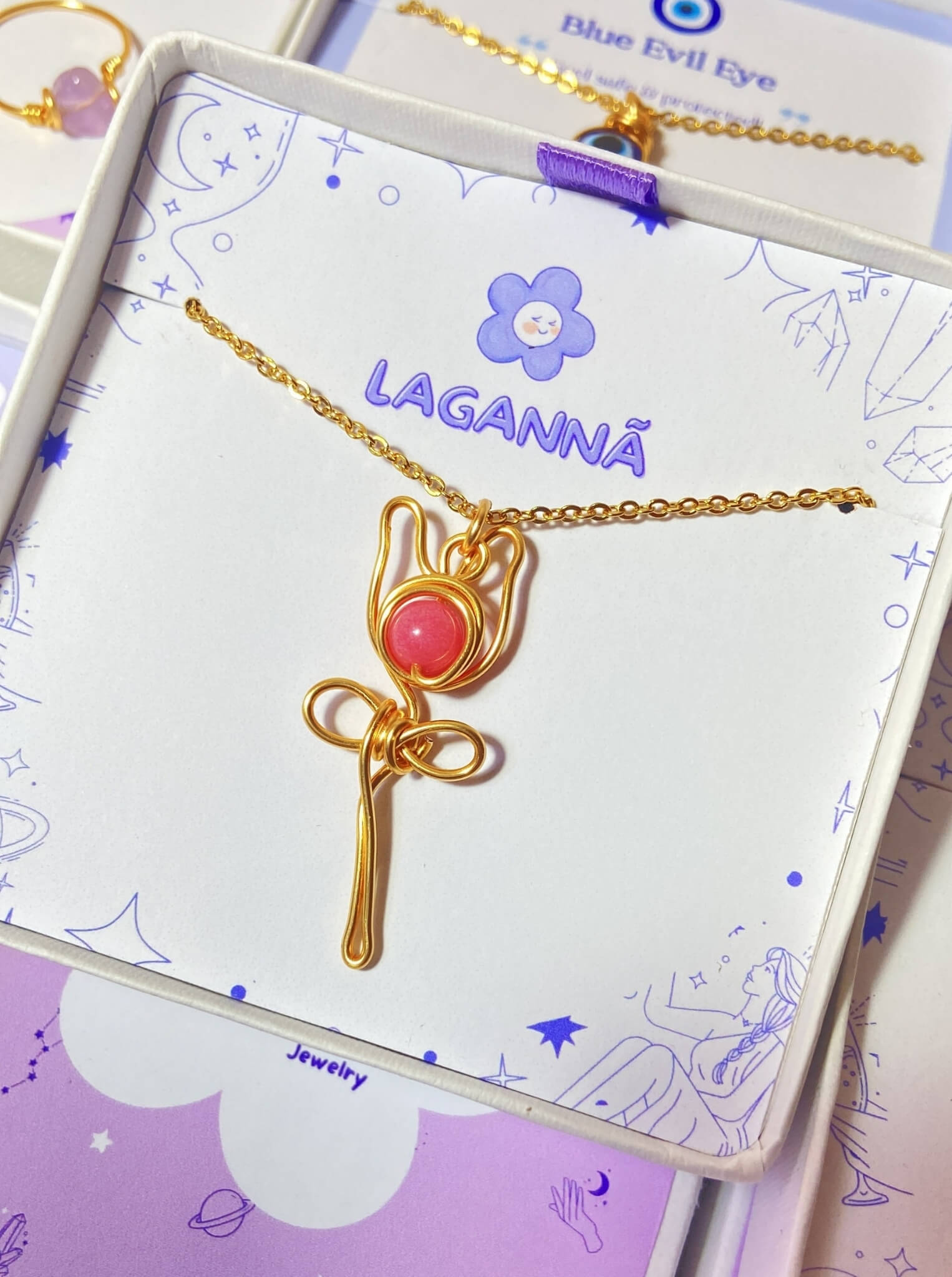 Handmade pink chalcedony blush rose pendant necklace with gold wire wrapping, beautifully presented in Laganna jewelry box - healing crystal jewelry crafted by Sri Lankan artisans, perfect feminine gift for self-love
