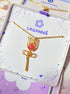 Handmade pink chalcedony blush rose pendant necklace with gold wire wrapping, beautifully presented in Laganna jewelry box - healing crystal jewelry crafted by Sri Lankan artisans, perfect feminine gift for self-love