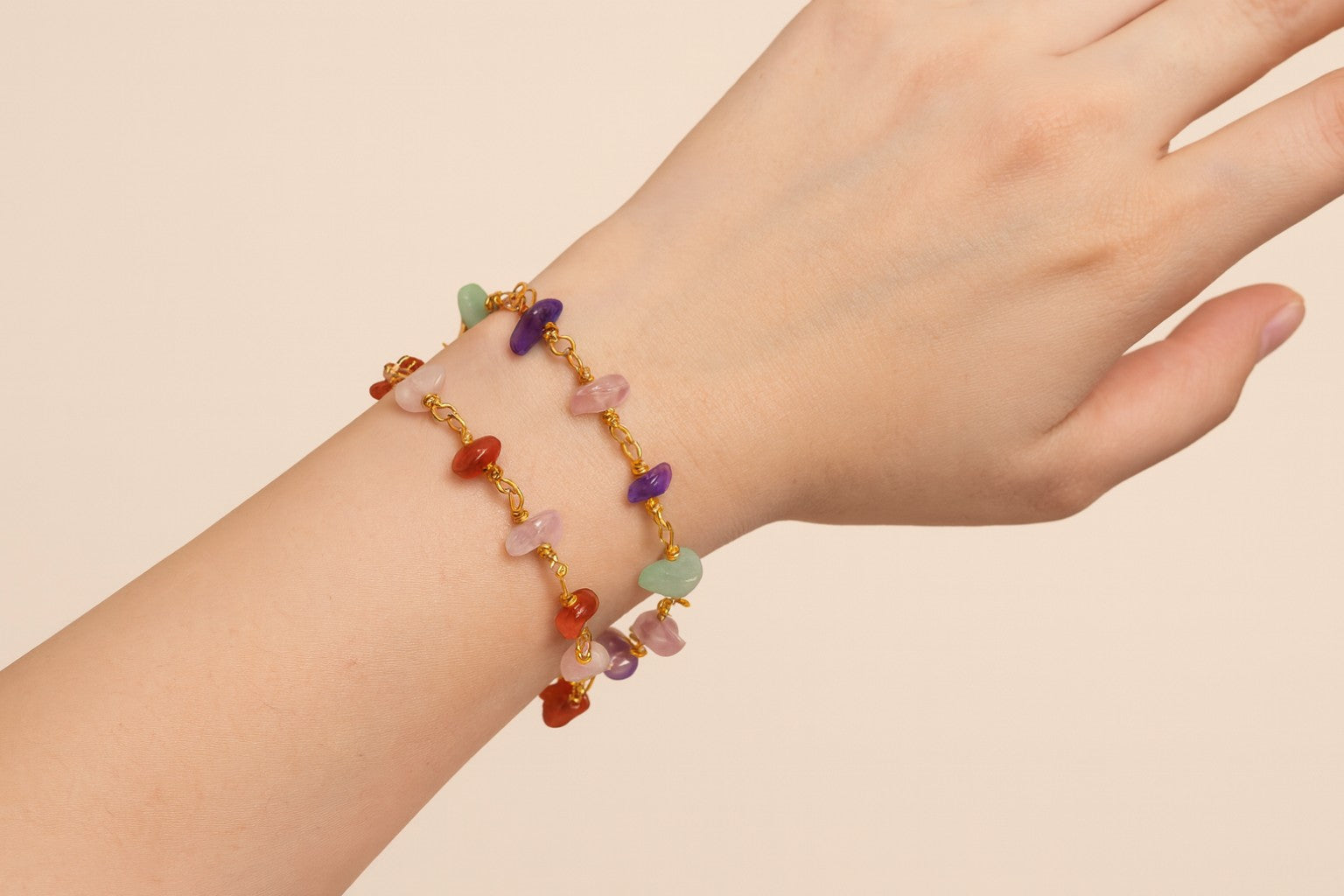 Both bracelets worn together in realistic stacking style showing accurate scale and details