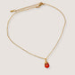 Carnelian drop necklace full look showing handmade gold wire wrapped healing crystal pendant, Sri Lankan spiritual jewelry featuring natural orange gemstone perfect as boho statement necklace and protective amulet for confidence and creative energy enhancement