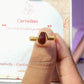 Carnelian irregular stone ring jewelry box held in hand showing handmade gold wire wrapped healing crystal gift set, Sri Lankan artisan creativity stone ring featuring natural orange gemstone perfect as courage jewelry gift for motivation and confidence enhancement with premium packaging
