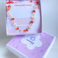 Elegant Chinese Red Lantern crystal bracelet with carnelian and rose quartz in premium Laganna jewelry box packaging on white background - handmade wire wrapped healing gemstone bracelet from Sri Lanka for Chinese New Year gifts and festive celebrations