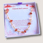 Handmade Chinese Red Lantern crystal bracelet with carnelian and rose quartz in gold wire wrapping, beautifully presented in elegant Laganna jewelry box on white background - healing gemstone bracelet crafted by Sri Lankan artisans for warmth and love energy