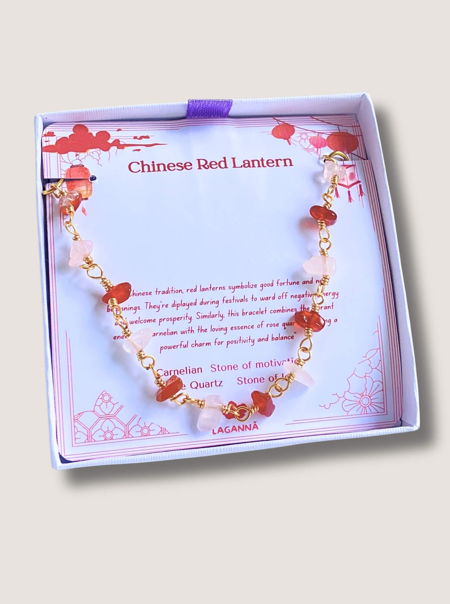 Handmade Chinese Red Lantern crystal bracelet with carnelian and rose quartz in gold wire wrapping, beautifully presented in elegant Laganna jewelry box on white background - healing gemstone bracelet crafted by Sri Lankan artisans for warmth and love energy