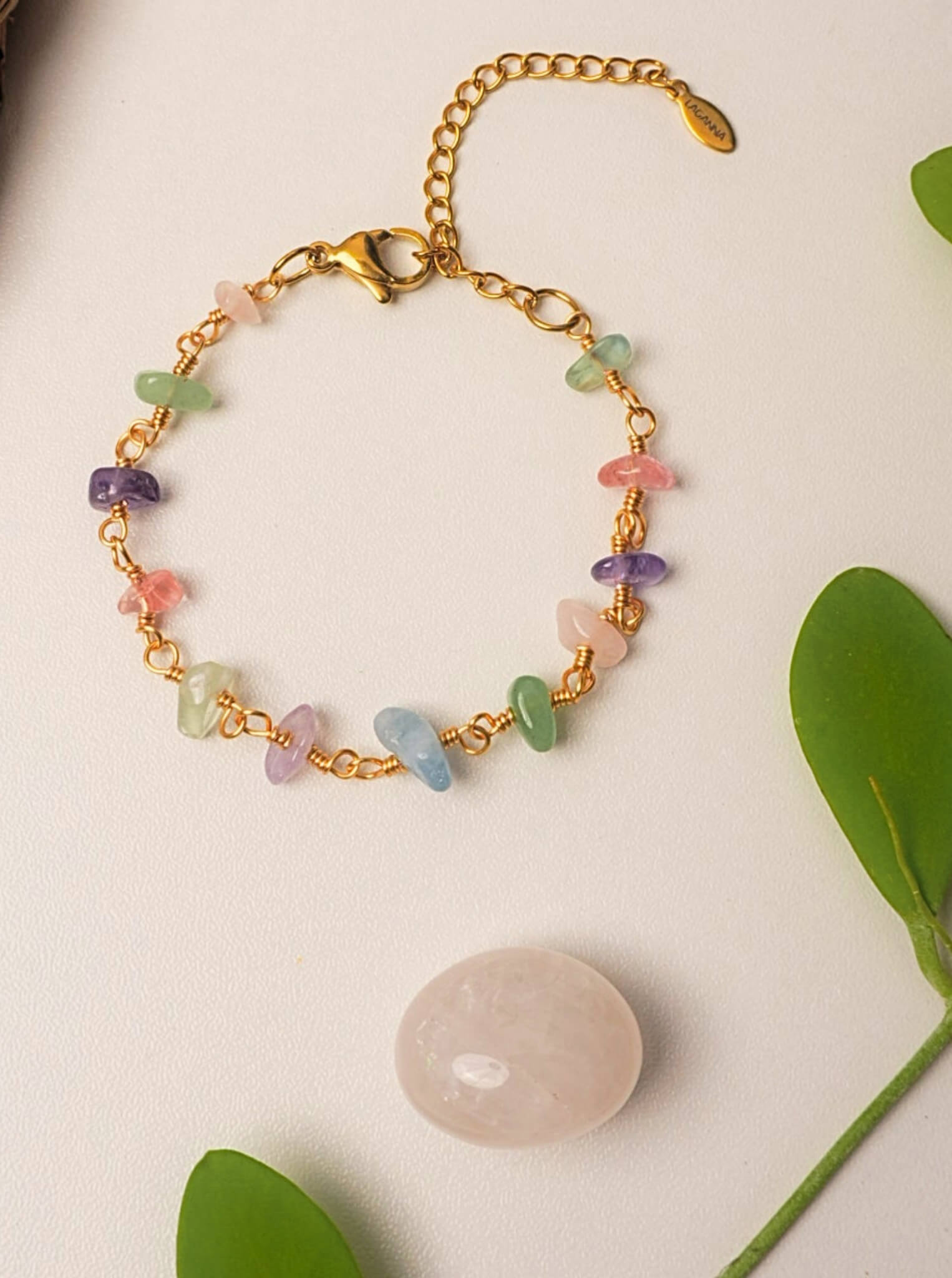 Chinese Tea House Bracelet rose quartz amethyst green aventurine aquamarine fluorite crystal chips gold wire bracelet overhead flat lay with green leaves and rose quartz stone prop, handmade healing crystal bracelet Sri Lanka – Laganna
