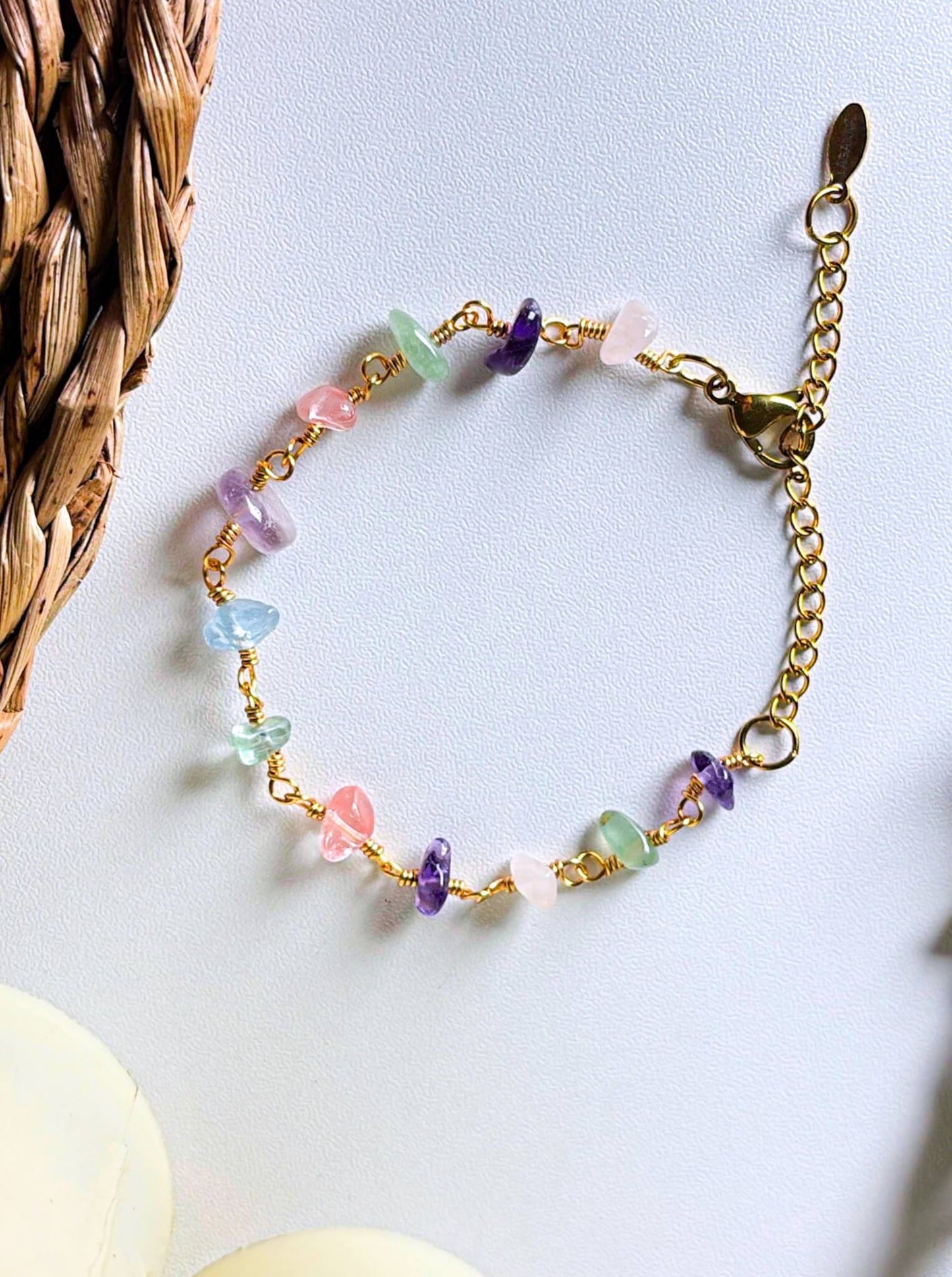 Chinese Tea House Bracelet rose quartz amethyst green aventurine aquamarine fluorite crystal chips gold wire linked bracelet overhead flat lay with rattan prop, handmade healing crystal bracelet Sri Lanka – Laganna

