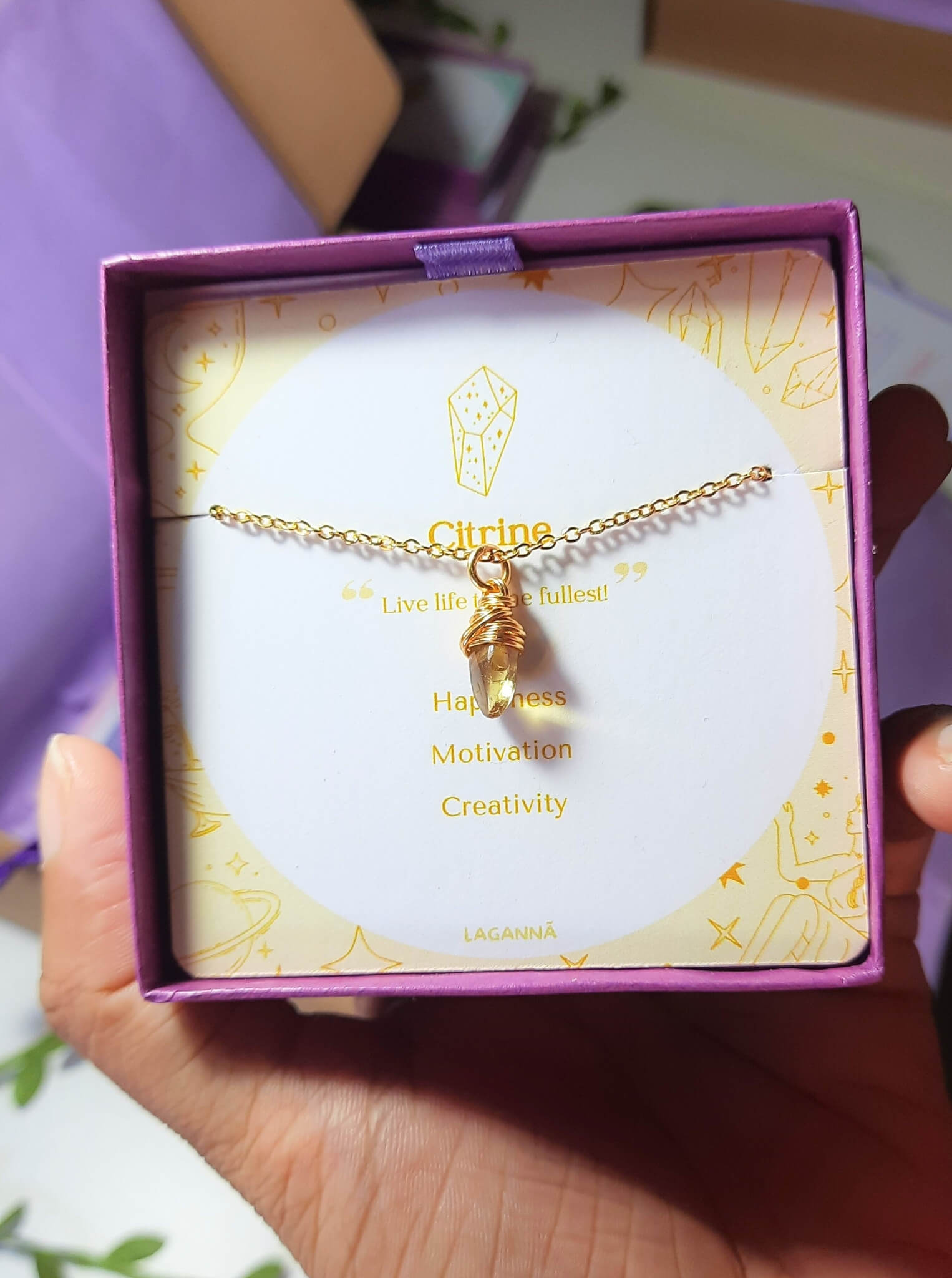 Citrine irregular stone necklace jewelry box held on hand, handmade Sri Lankan gold wire wrapped healing crystal pendant gift for abundance and joy