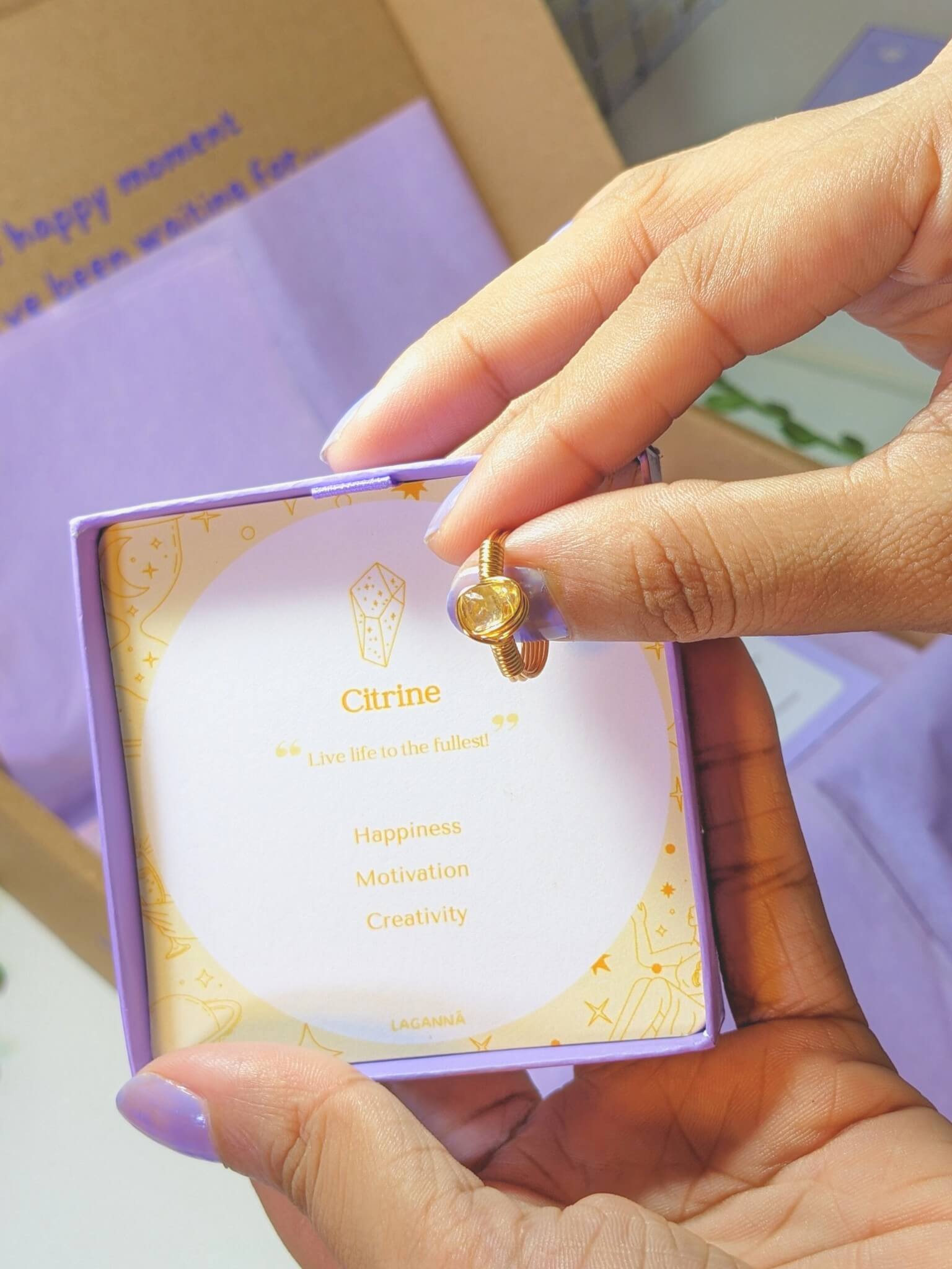  Citrine irregular stone ring jewelry box held in hand showing handmade gold wire wrapped healing crystal gift set packaging, Sri Lankan artisan abundance ring featuring natural yellow gemstone perfect as prosperity jewelry gift for confidence and manifestation