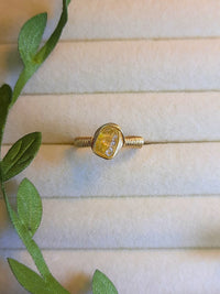 Handmade citrine irregular stone ring in gold wire wrapped design featuring natural healing crystal jewelry crafted by Sri Lankan artisans as abundance stone ring and solar plexus chakra balancing amulet for women seeking prosperity and confidence with raw yellow gemstone energy