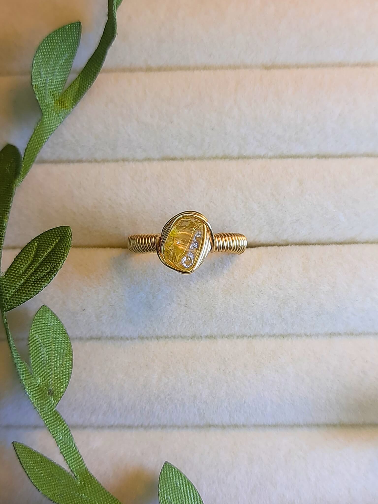 Handmade citrine irregular stone ring in gold wire wrapped design featuring natural healing crystal jewelry crafted by Sri Lankan artisans as abundance stone ring and solar plexus chakra balancing amulet for women seeking prosperity and confidence with raw yellow gemstone energy