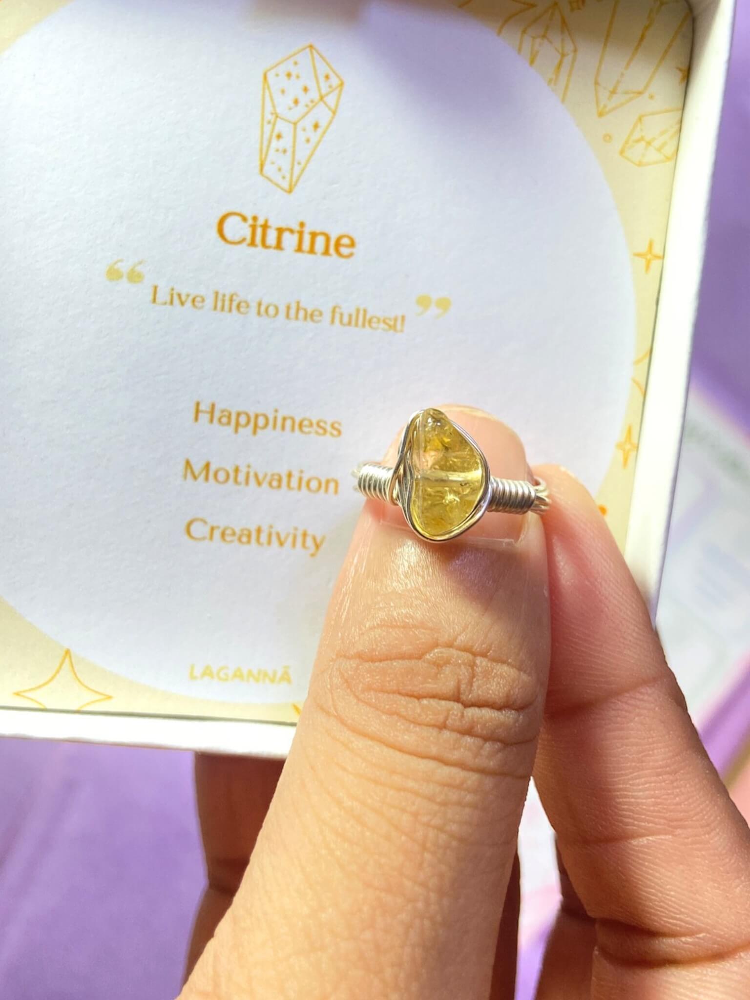 Citrine irregular stone ring in silver wire wrapped design with jewelry box held in hand showing handmade healing crystal gift set, Sri Lankan artisan abundance ring featuring natural yellow gemstone perfect as prosperity jewelry gift for confidence and solar plexus chakra balancing