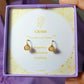 Citrine Mini Round Stud Earrings packaging with crystal meaning card - handcrafted wire-wrapped healing jewelry gift from Sri Lanka featuring natural citrine stone for motivation, happiness, and creativity
