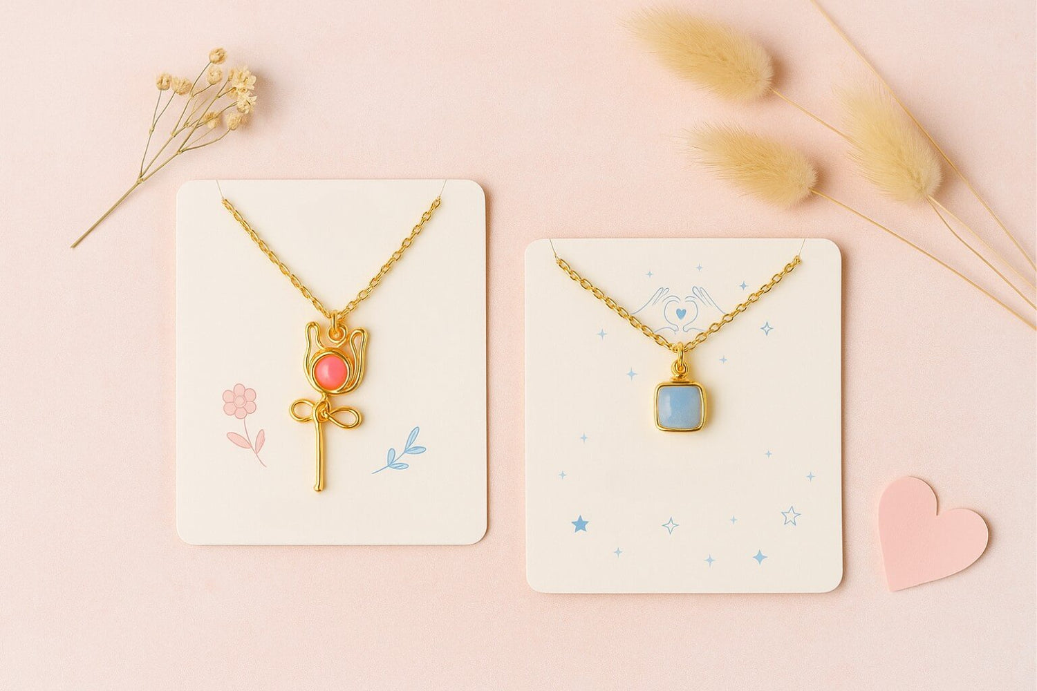 Clean friendly aesthetic flat lay featuring Blush Rose pendant necklace with pink chalcedony and Aquamarine square stone necklace in warm friendship styling