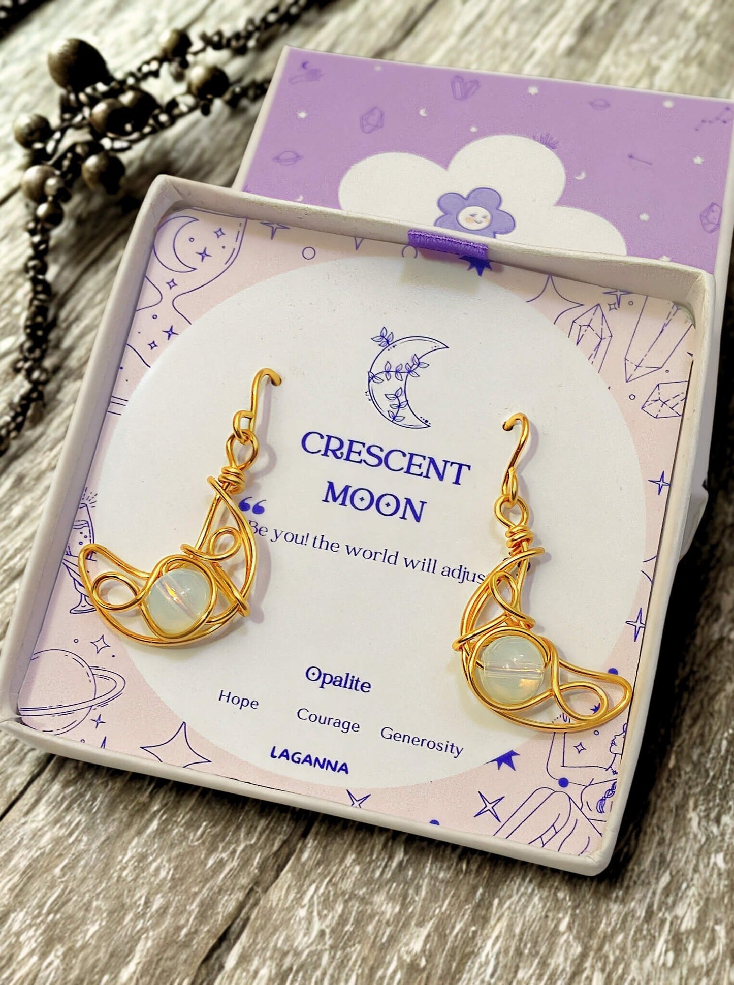 Elegant Crescent Moon Dangle Earrings featuring luminous Opalite stones, handmade gold wire wrapped celestial jewelry from Sri Lanka by Laganna - mystical bohemian accessories for spiritual transformation