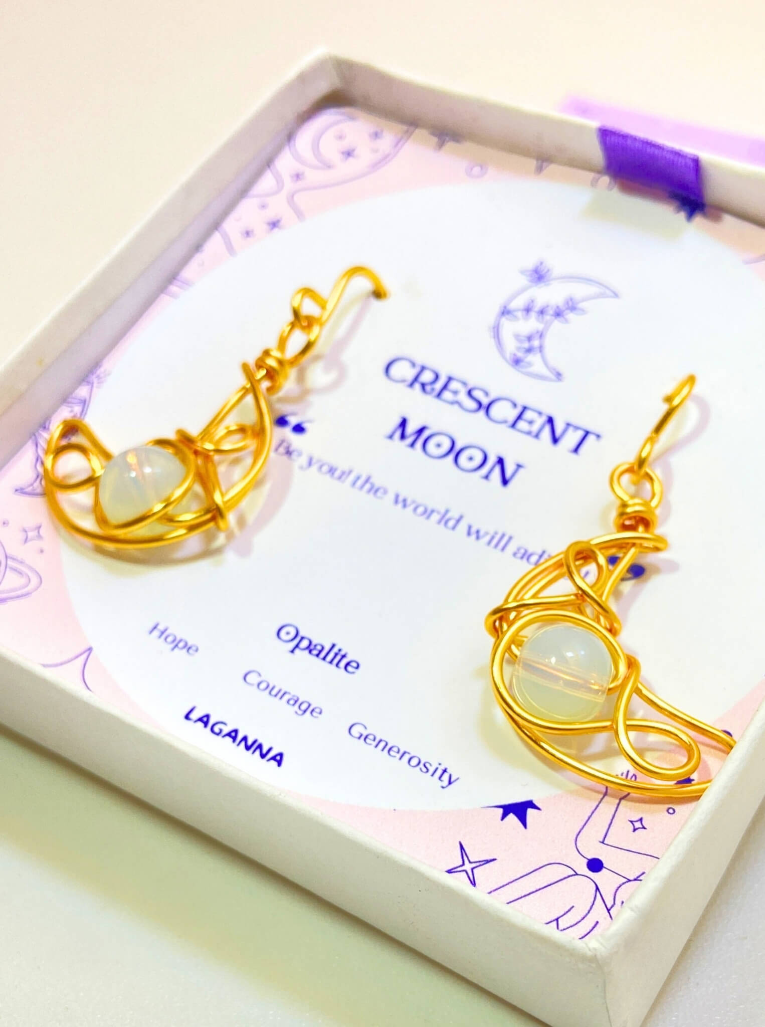 Detailed view of Crescent Moon Dangle Earrings with iridescent Opalite stones, handmade gold wire wrapped celestial jewelry from Sri Lanka by Laganna - premium healing crystal bohemian earrings