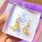 Beautiful Crescent Moon Dangle Earrings with Opalite healing crystals, handmade gold wire wrapped celestial jewelry from Sri Lanka by Laganna, elegantly presented in premium gift box packaging