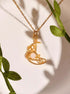 Crescent Moon Necklace Moonstone gold wire wrapped crescent pendant with green botanical leaves natural styling, handmade healing crystal jewelry Sri Lanka Laganna
