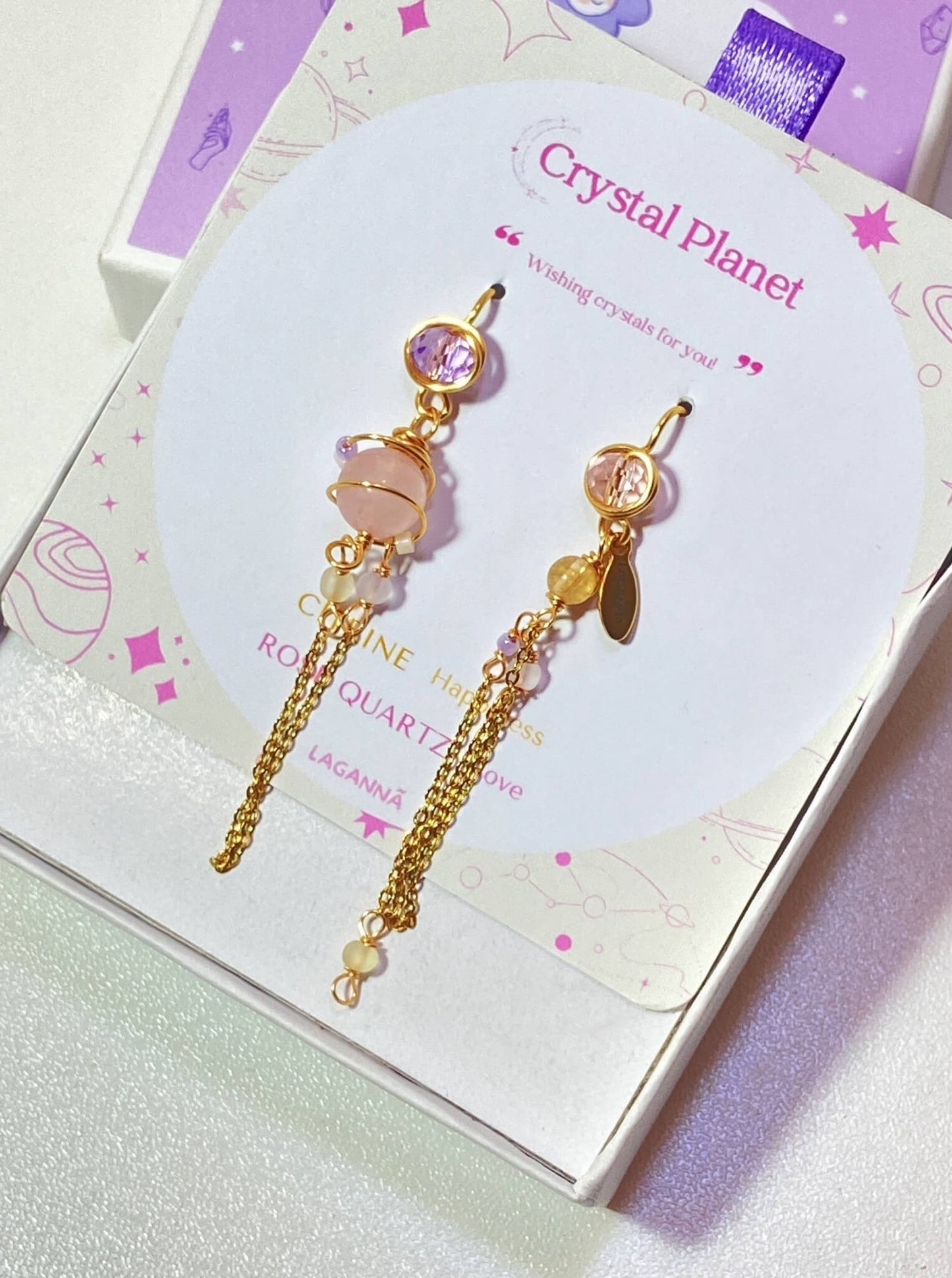 Mismatched dangle earrings with rose quartz and citrine jewelry box full view, handmade Sri Lankan crystal planet gold earrings for emotional healing and confidence