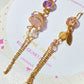 Crystal Planet mismatched dangle earrings with rose quartz and citrine in jewelry box, handmade Sri Lankan gold wire wrapped earrings for love and abundance