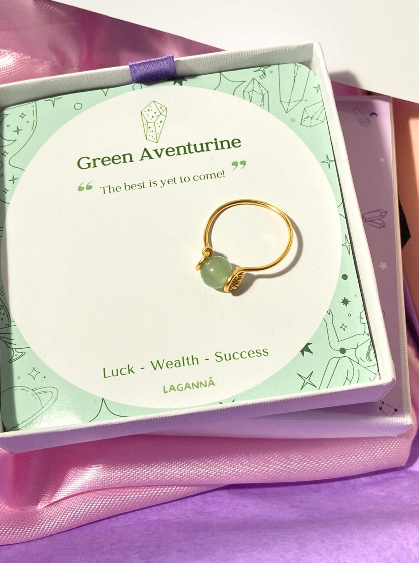 Dainty round green aventurine ring in gold wire wrap with jewelry box closeup, handmade Sri Lankan healing crystal ring for prosperity manifestation wealth luck opportunity stone