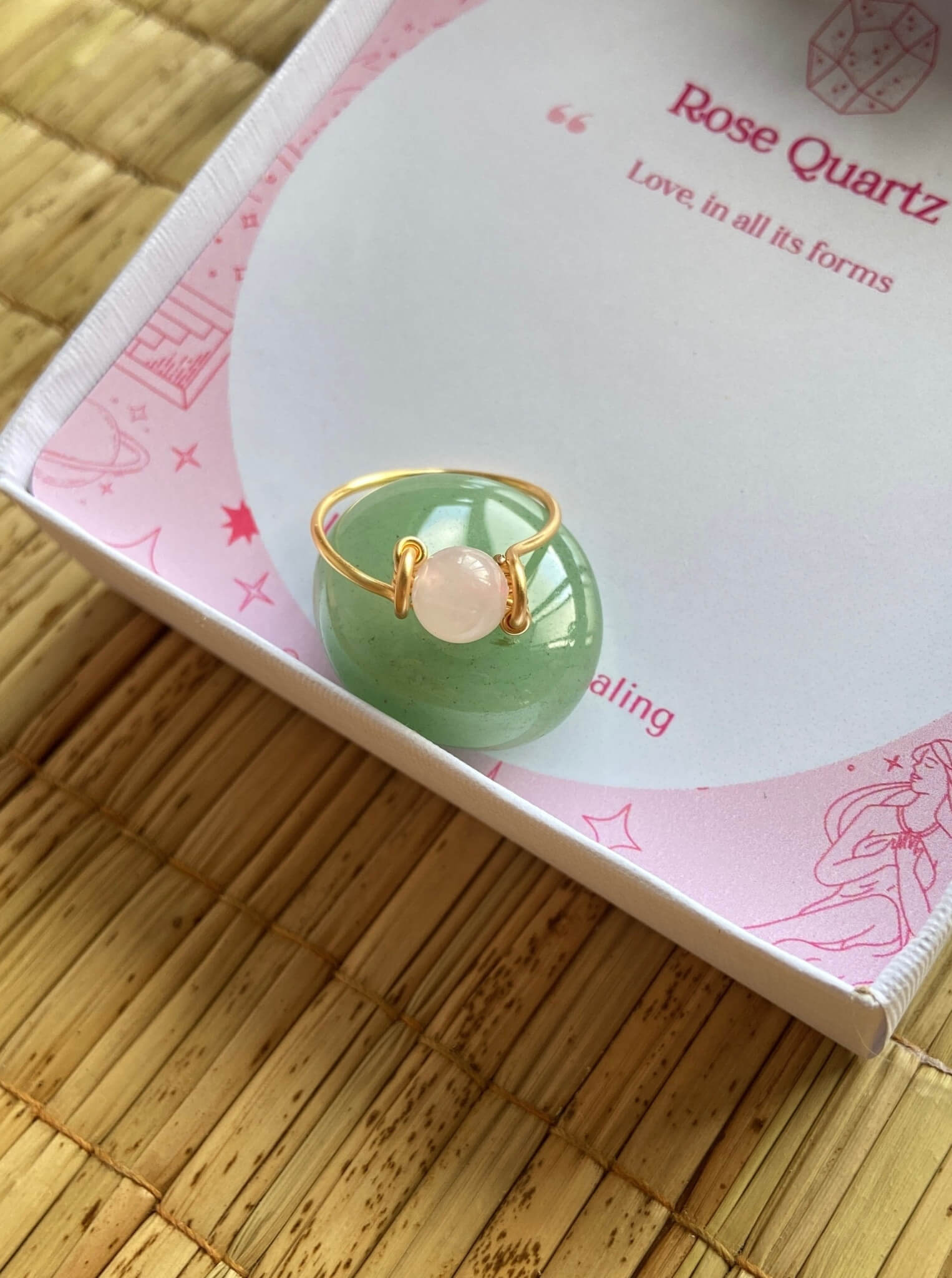 Handmade dainty round rose quartz ring with delicate wire wrap design featuring soft pink healing crystal stone for unconditional love self-compassion heart chakra jewelry Sri Lanka artisan crafted