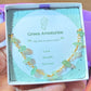 Fortune Bracelet Green Aventurine worn on hand showcasing gold wire wrapped design and natural green stones, handmade Sri Lankan healing crystal bracelet for wealth and success