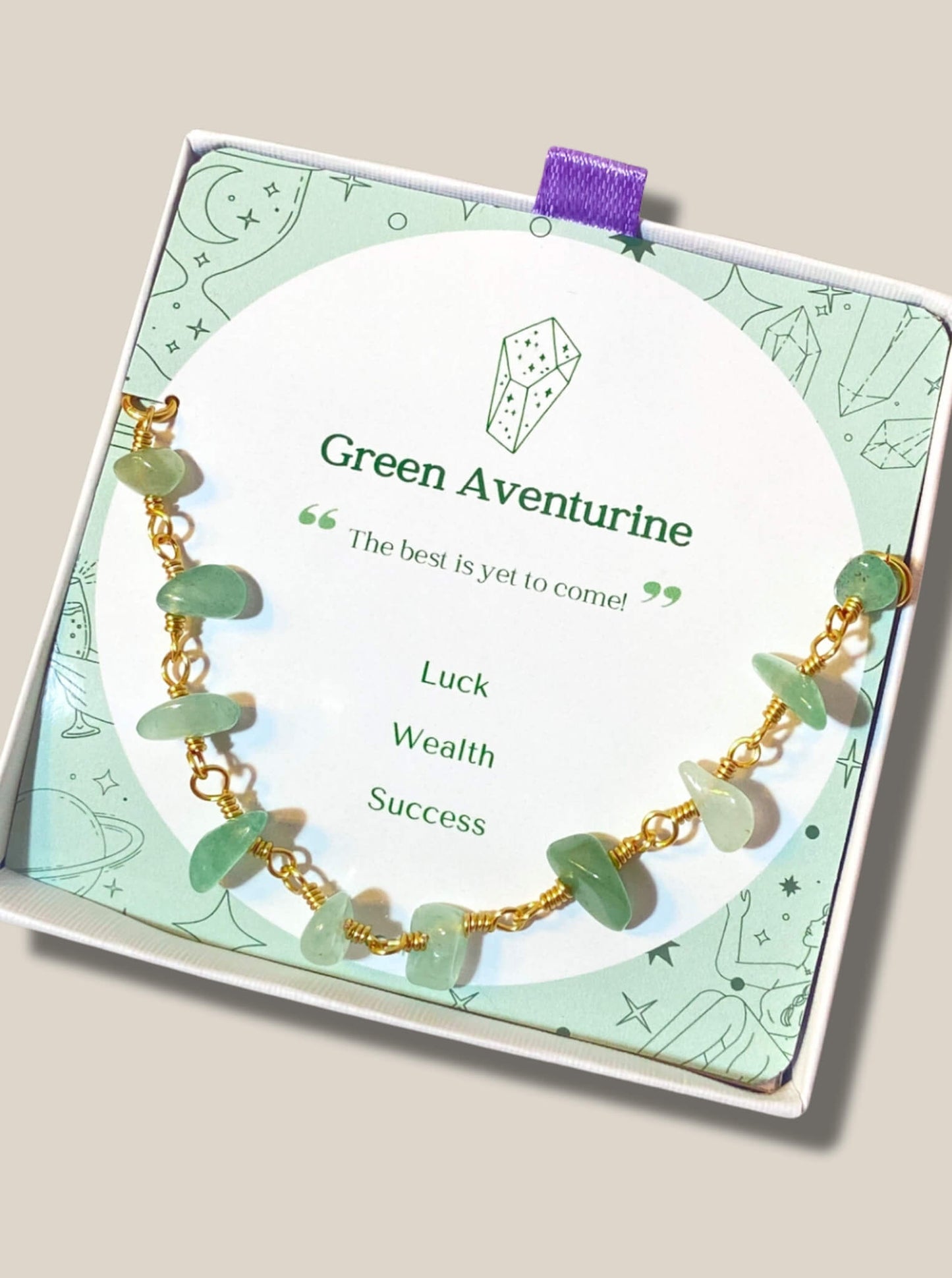 Fortune Bracelet Green Aventurine on white background with gold wire wrapped aventurine crystals, handmade Sri Lankan healing crystal bracelet for abundance and new beginnings