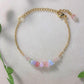 Handmade French Palace Bracelet in gold wire wrap featuring rose quartz, aquamarine and fluorite crystals, inspired by 18th century Rococo France, crafted in Sri Lanka