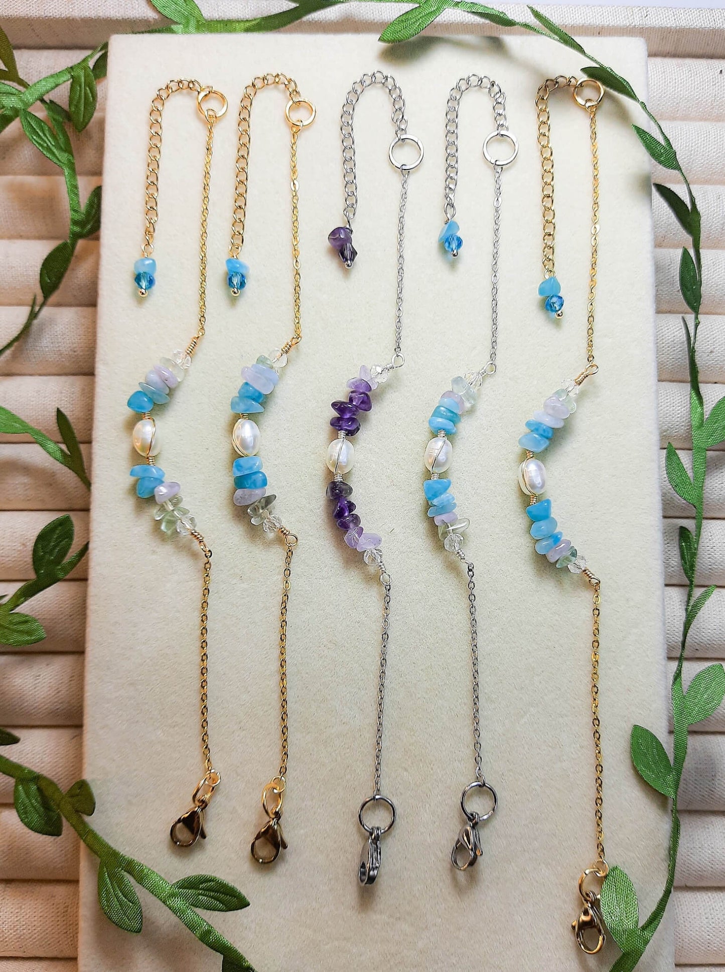 Freshwater Lake and Purple Lake Bracelet collection in gold and silver wire wrap showcasing water-inspired crystal jewelry palette, handmade in Sri Lanka