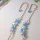 Two Freshwater Lake Bracelets in gold showcasing water-inspired crystal collection with aquamarine and blue gemstones, handmade Sri Lanka jewelry