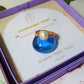 Freshwater pearl ring in gold wire wrap with jewelry box aesthetic styling, handmade Sri Lankan pearl jewelry for elegance and feminine energy