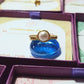  Natural freshwater pearl ring jewelry box closeup showing gold wire wrapped design, handmade Sri Lankan pearl jewelry for purity and emotional balance