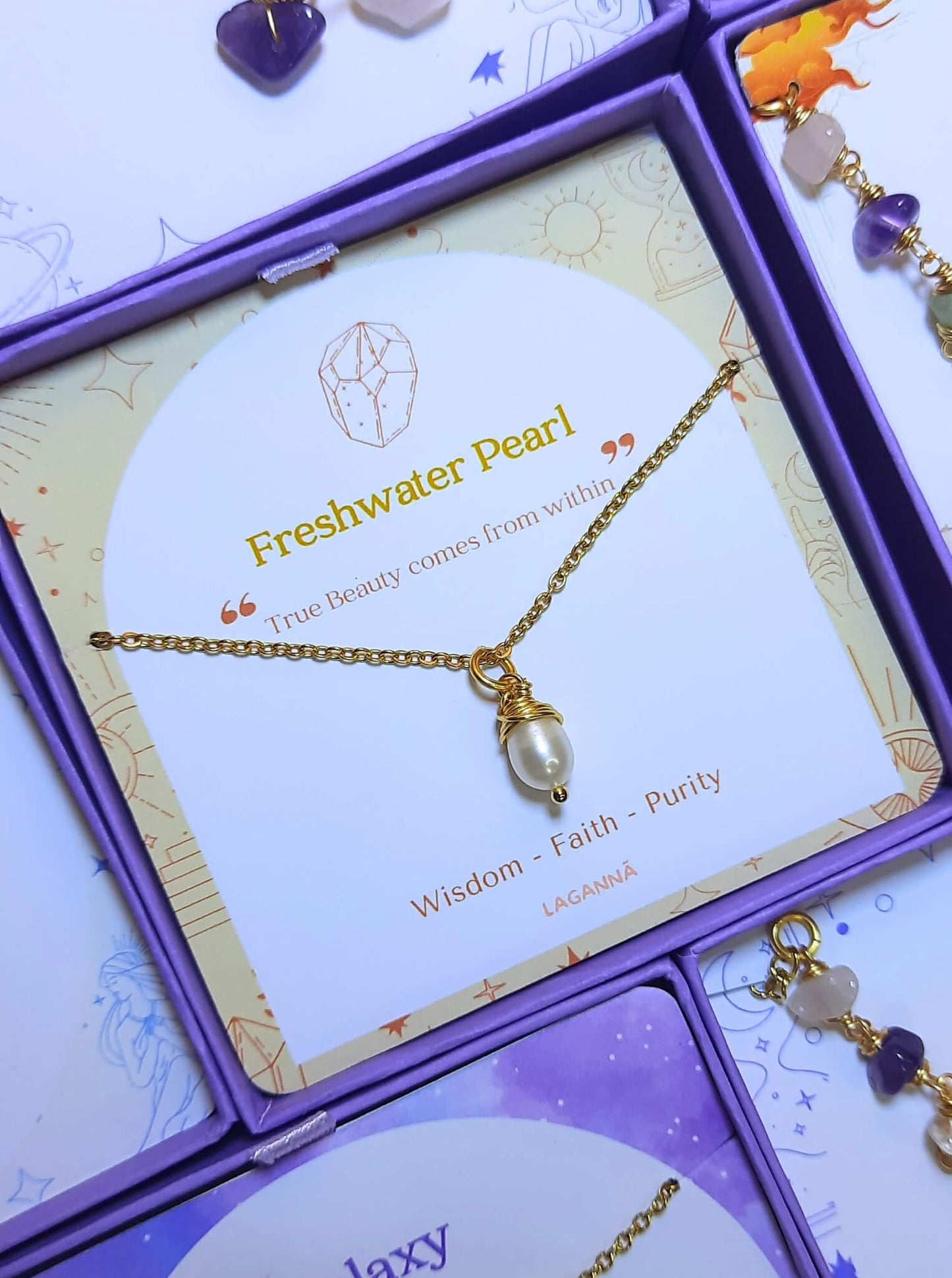 Handmade freshwater pearl necklace jewelry box side view showing gold wire wrapped design, Sri Lankan pearl pendant for wisdom and calming energy